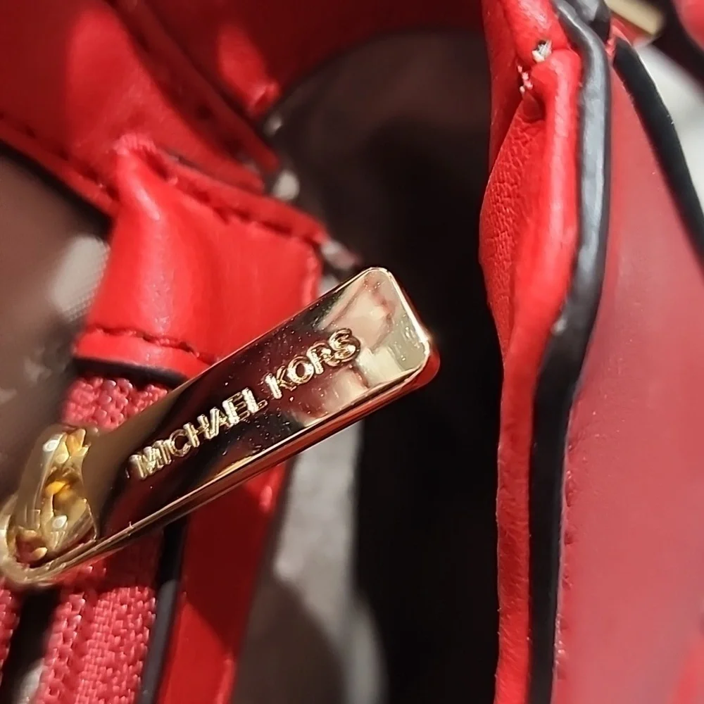 Gently used Michael Kors‎ red leather crossbody bag.